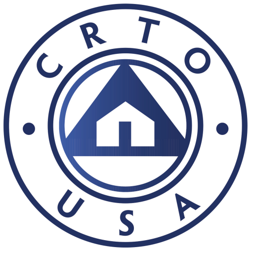 A circular logo with "CRTO" at the top and "USA" at the bottom. Inside the circle is another circle featuring a geometric house shape within a triangle. The design is in varying shades of blue.